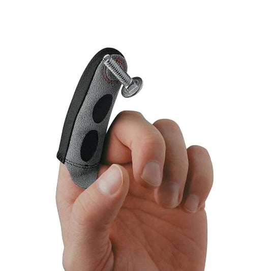 Black and gray finger magnet being used on a person's hand against a white background