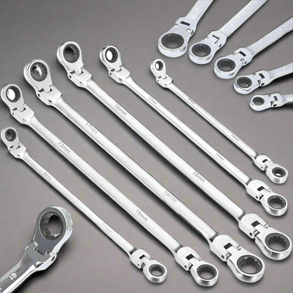 Set of silver ratcheting wrenches on a white background