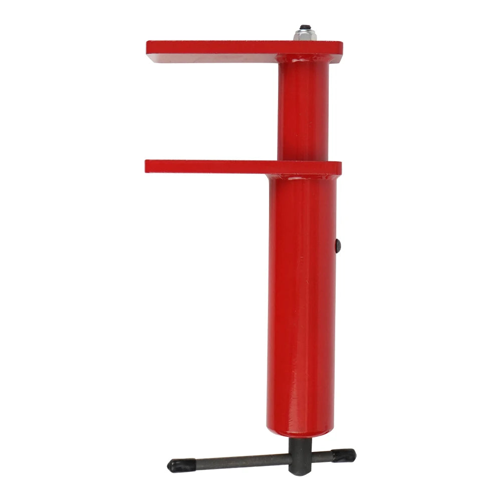 Red caliper spreader on a white background
